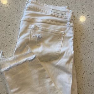 White articles of society Jeans